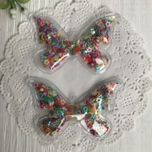 Силіконовий метелик з наповнювачем, 7х4,5 см, різнокольорові порожні зірки, шт.