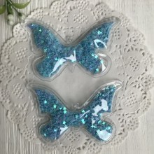 Силіконовий метелик з наповнювачем, 7х4,5 см, бірюзові зірки, шт.