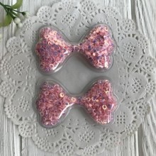 Силіконовий бантик з наповнювачем, 6,3 х3, 6 см, рожеві перламутрові кільця, шт.