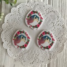 Кабошон, 3 х 4 см, єдиноріг з обідком із квітів